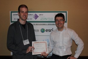 Andrew recieving his award from the Chair of the Newfoundland and Labrador branch of the CIG, Dr. Rodolphe Devillers