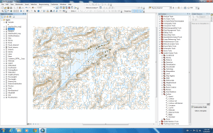 Here is a screen shot of some of the work I was working on. The contours were produced from my DEM of the area and the blue stream network from the Hydrology Toolset in Spatial Analyst. You can see the steep slopes around the lake, which makes for interesting collection methods to get my lichens off the rock!